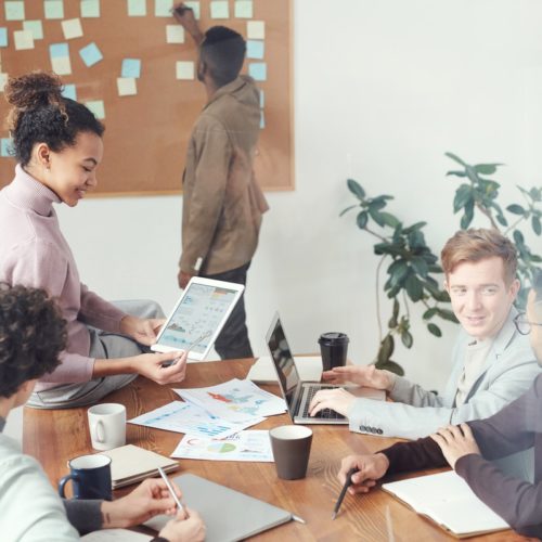 group-of-people-sitting-indoors-3184293